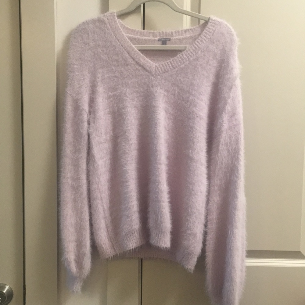 Lavender fluffy sweater with balloon sleeves.